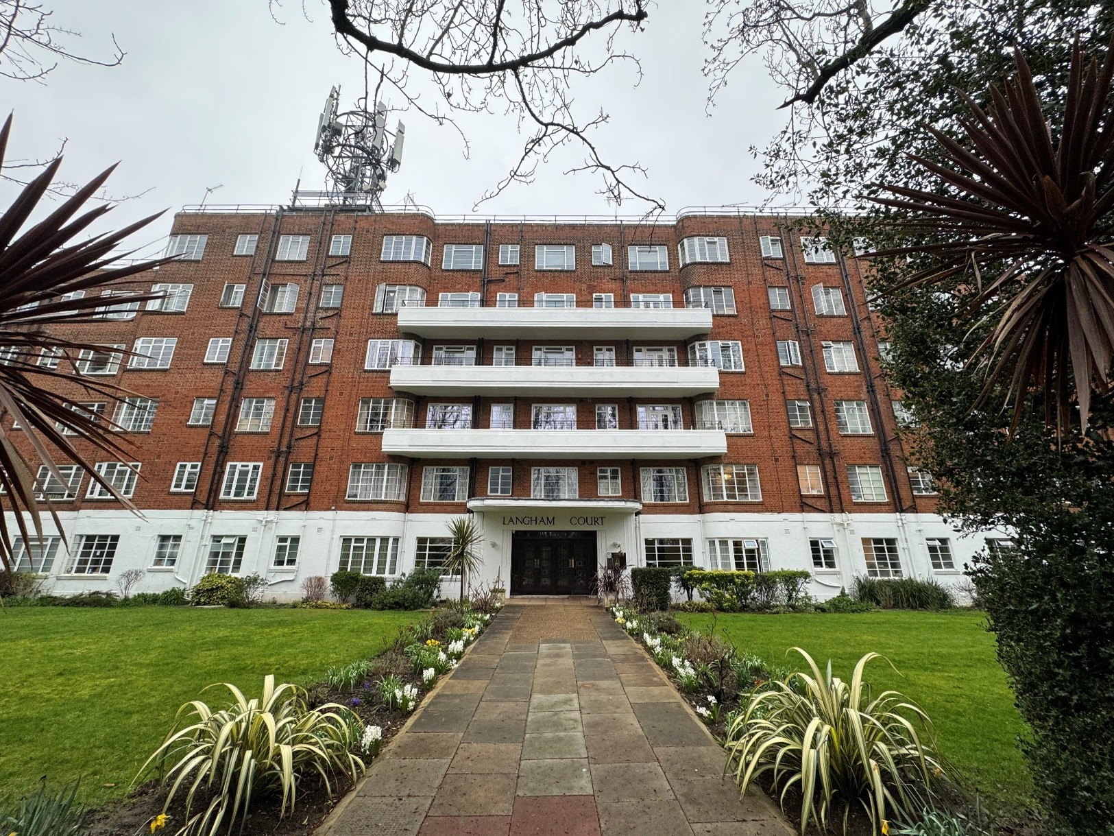 Lease extension case study for a flat in Langham Court, Raynes Park SW20